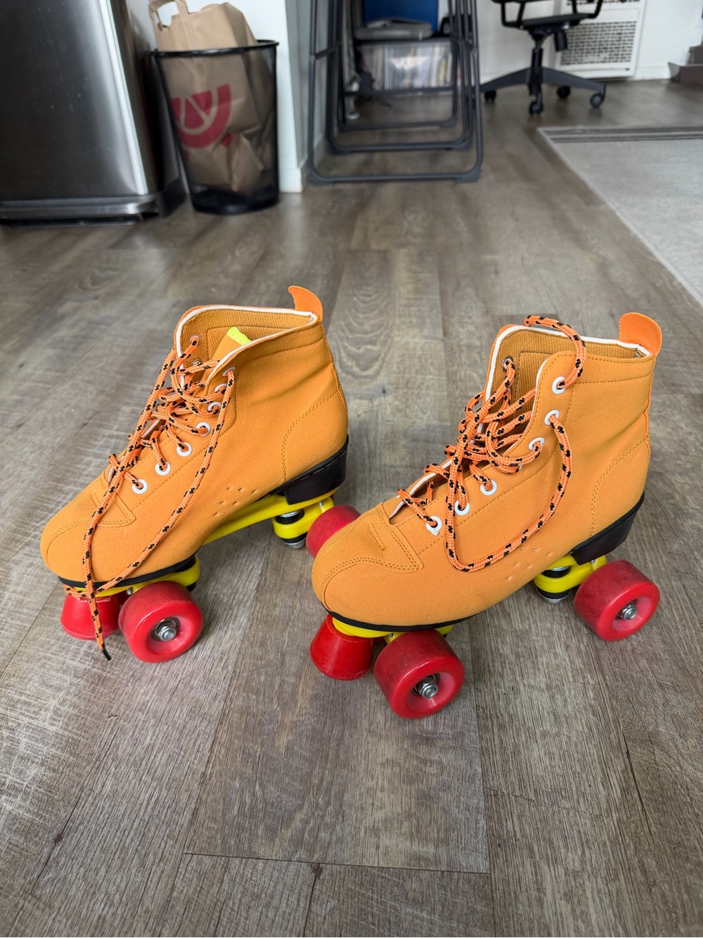Orange Retro Roller Skates with Red Wheels